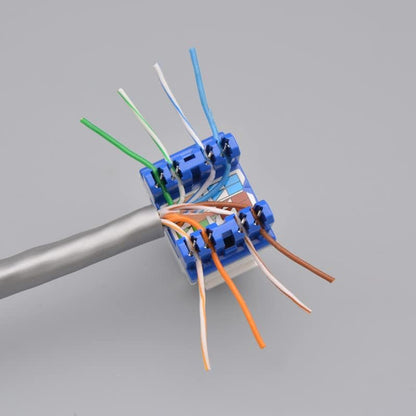 Keystone Jack UTP Cat6 with color-coded wires connected for network data installation.
